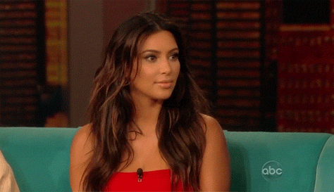 Kim-_Kardashian-nodding-on-a-couch-_GIFgif
