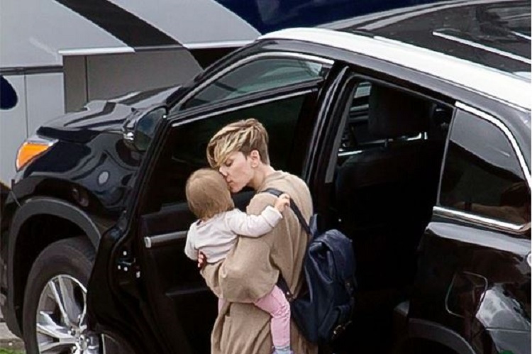 Scarlett Driving with her baby